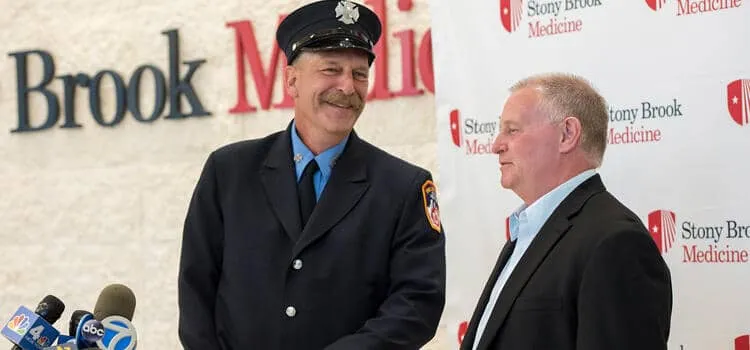 Cliff in uniform standing next to Bob Short